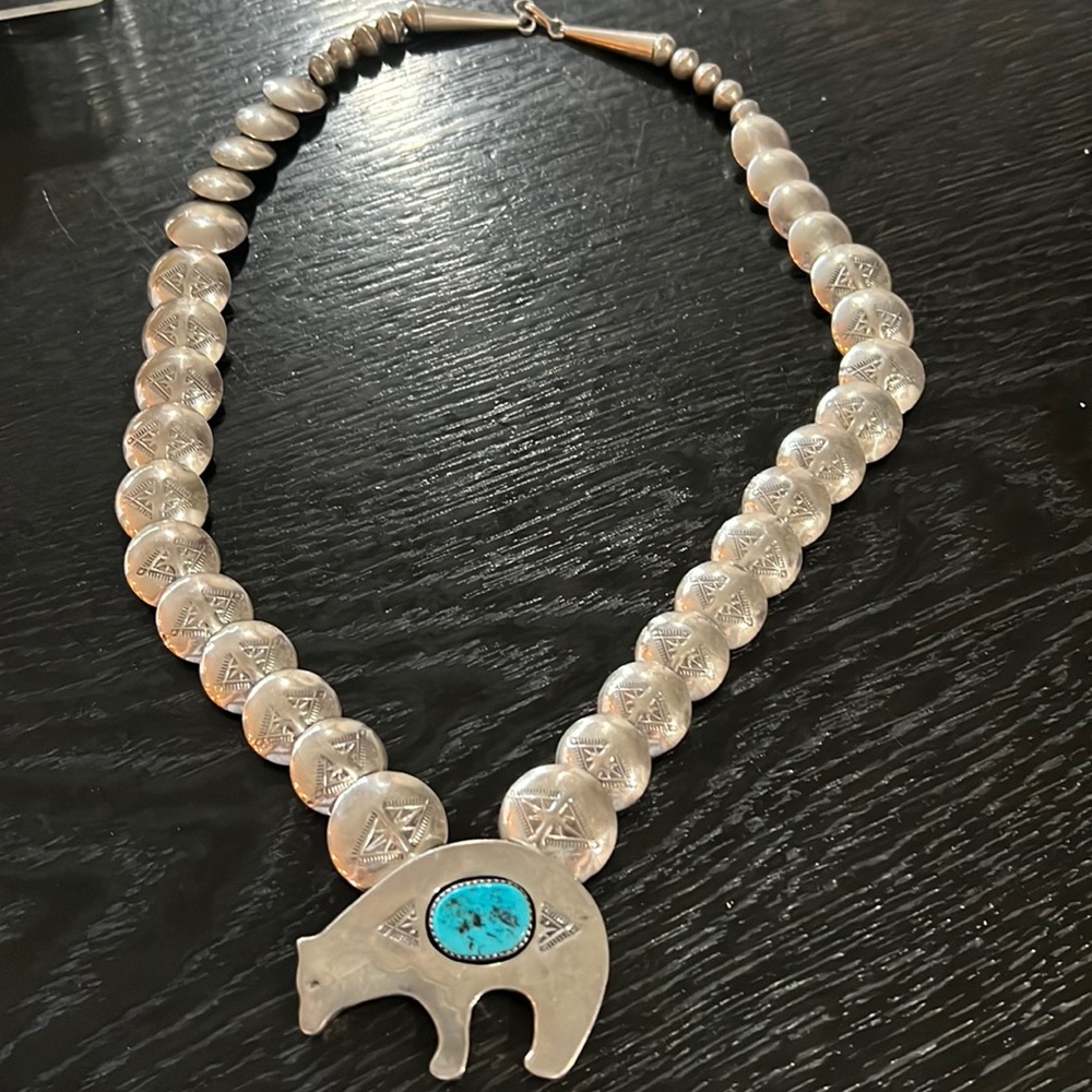 Sterling silver necklace with a bear and turquoise stone